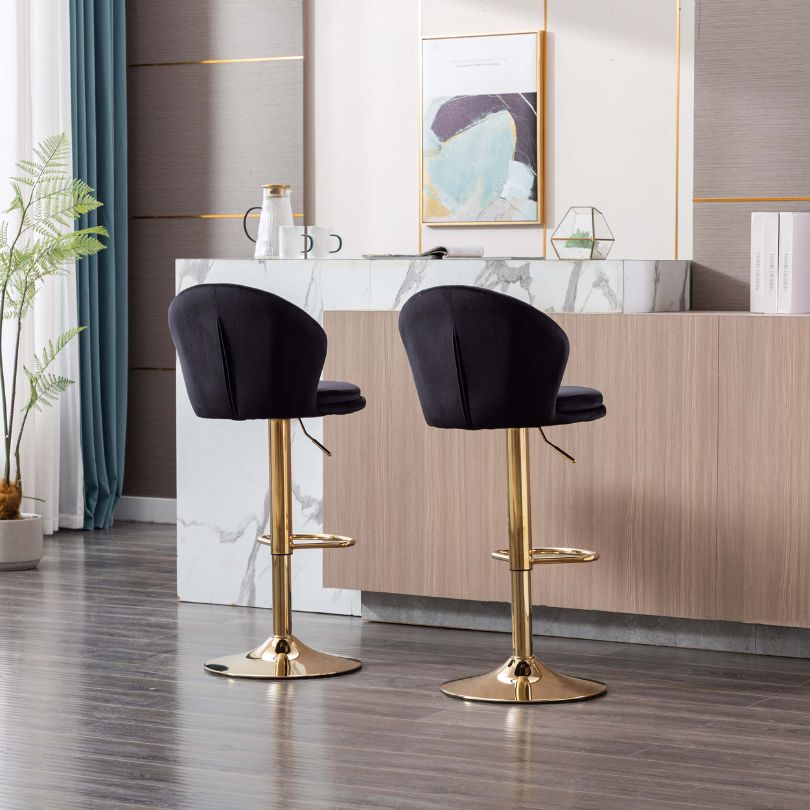 Side view of the luxury black velvet bar stool showcasing the chrome base.