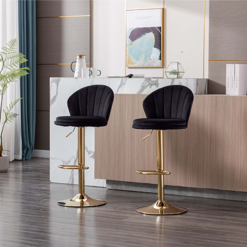 Side view of the luxury black velvet bar stool showcasing the chrome base.