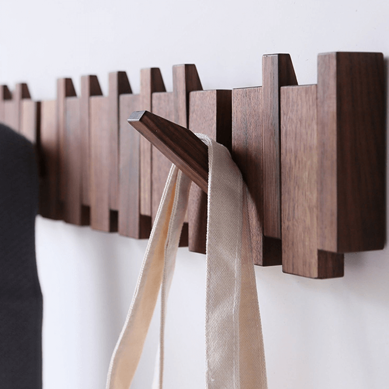 Functional coat rack featuring multiple hooks, perfect for home or office use.
