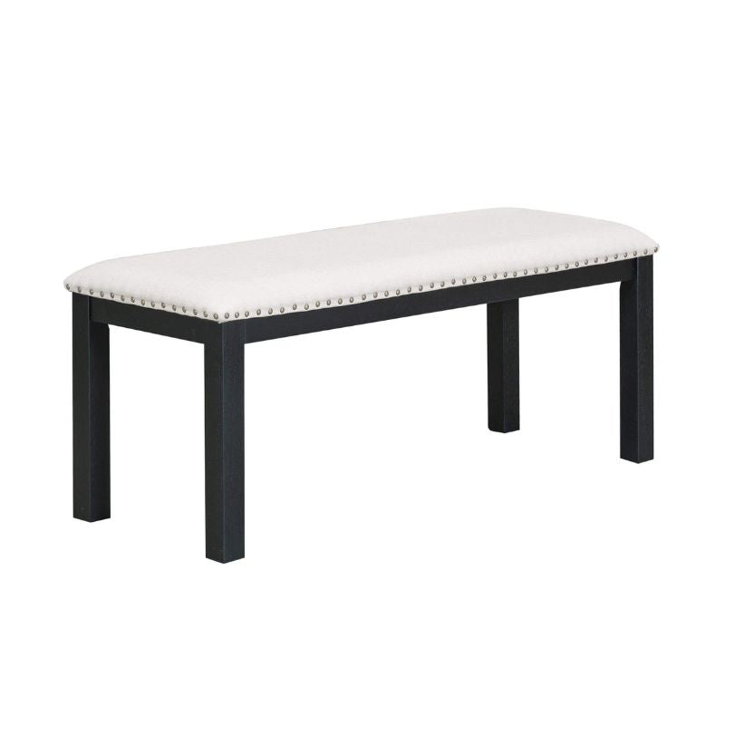 Close-up of the black and beige dining table with a cozy setup for family dining.