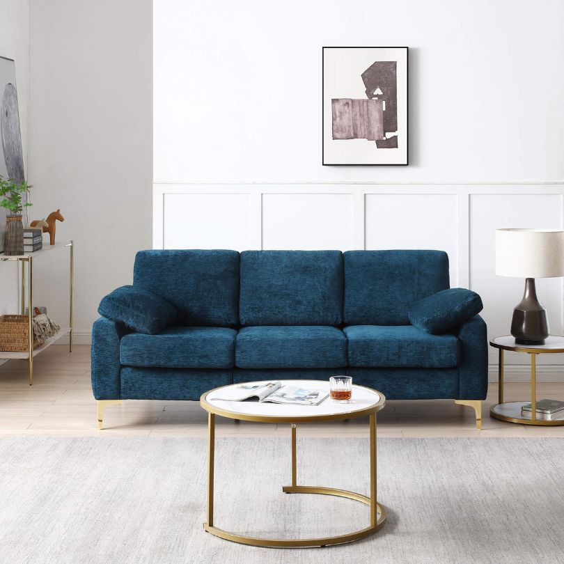 Elegant blue chenille 3-seater sofa in a modern living room setting.