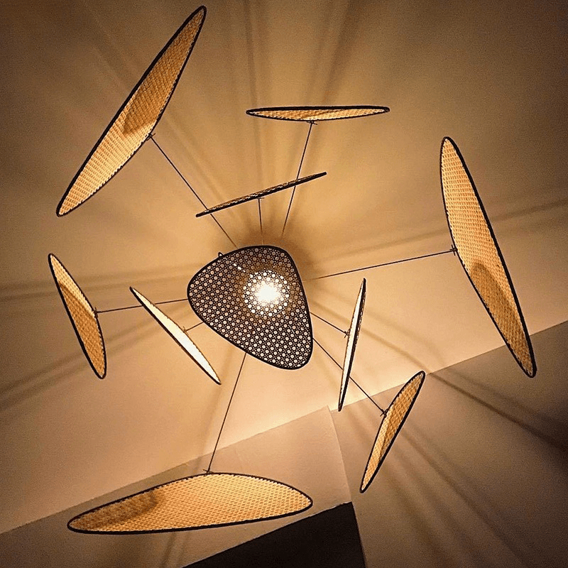 Boho Chic Rattan Pendant Ceiling Light showcasing its natural rattan finish and adjustable height.