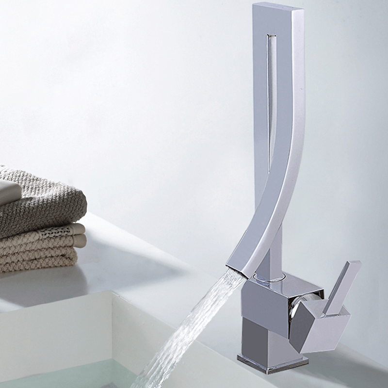 Stylish installation of the deck-mounted mixer faucet in a contemporary bathroom.