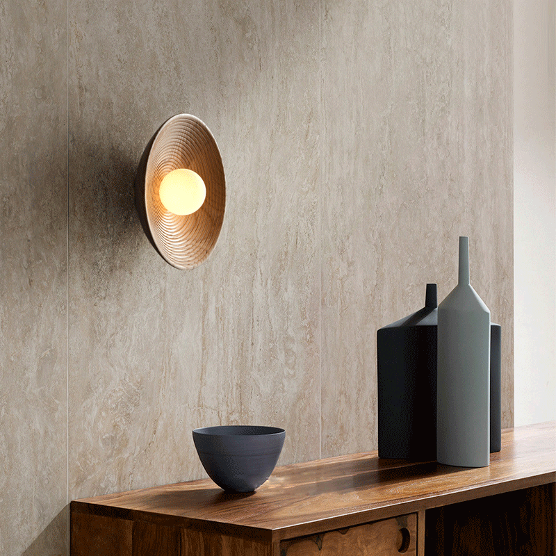 Close-up of the wooden lamps intricate design and smooth finish.