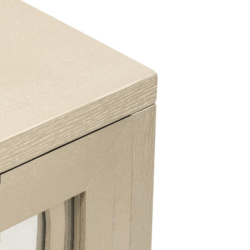 Elegant champagne gold sideboard in a dining room setting, featuring stylish decor and ample storage.