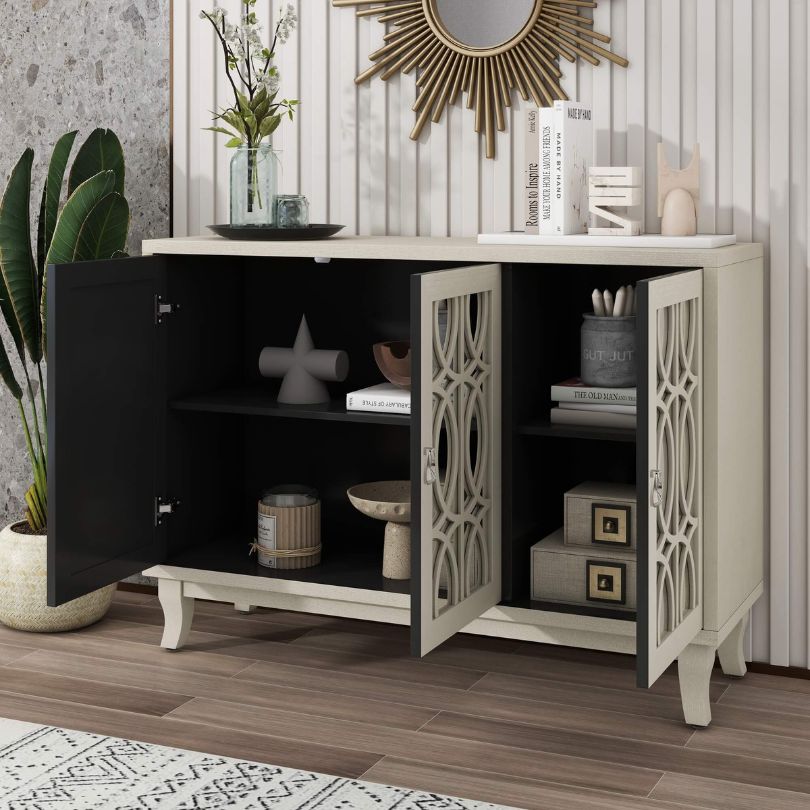 Close-up of the silver handles on the mirrored buffet cabinet, showcasing its luxurious design.