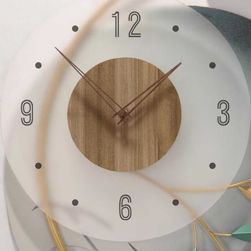The wall clock displayed in a modern living room setting, enhancing the decor with its elegant presence.