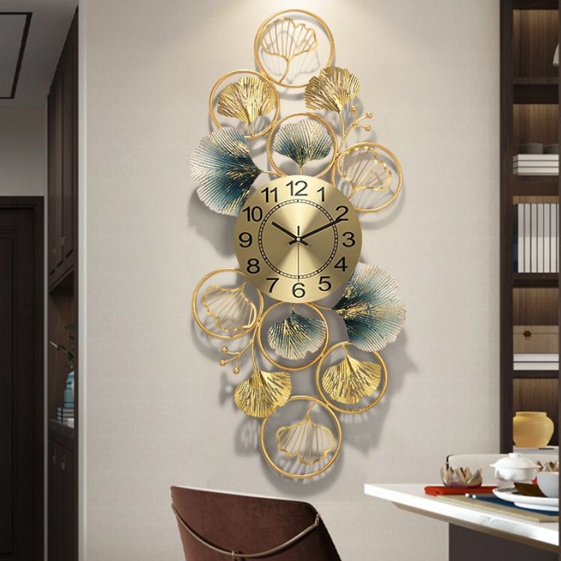Close-up of the unique ginkgo leaf pattern on the decorative clock.