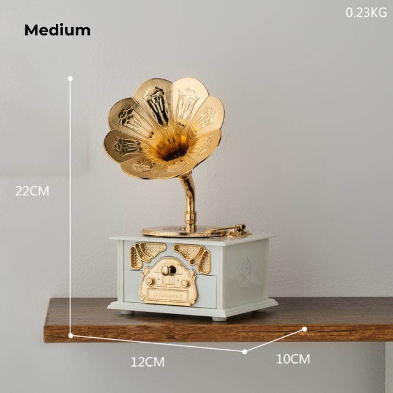 Vintage phonograph music box figurine showcasing intricate details and craftsmanship, perfect for home decoration.