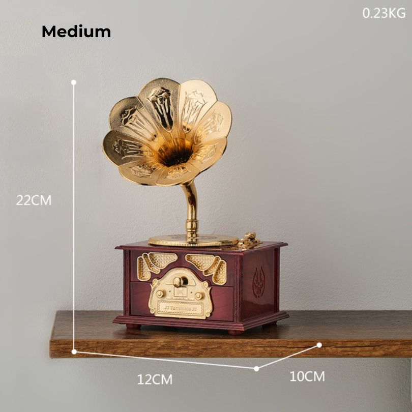 Vintage phonograph music box figurine showcasing intricate details and craftsmanship, perfect for home decoration.