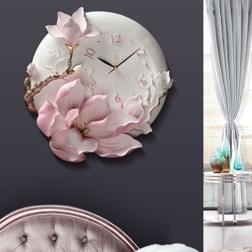 Close-up view of the orchid flower wall clock highlighting gold accents