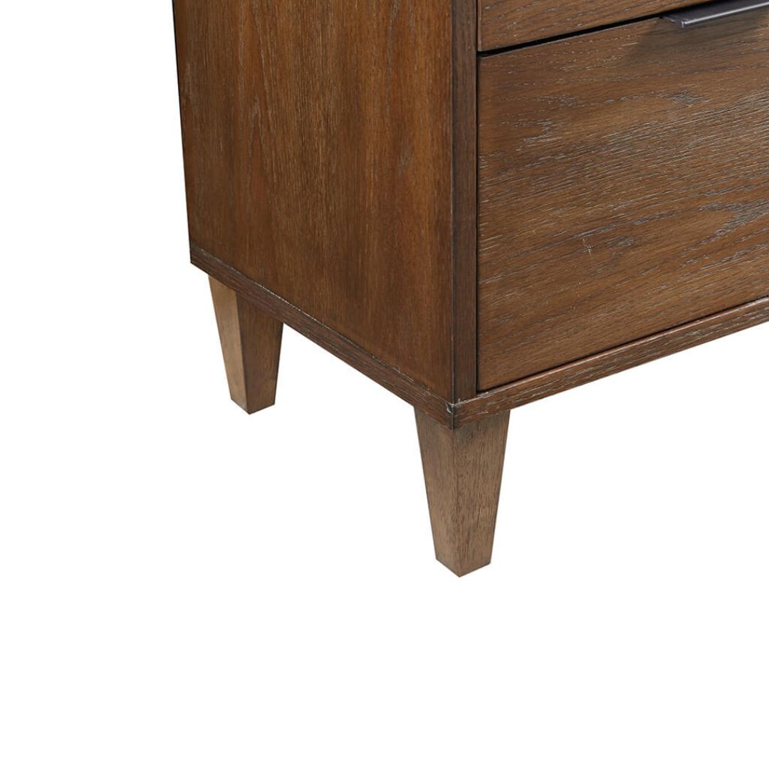 Close-up of the drawer handles on the stylish storage chest, emphasizing its contemporary look.