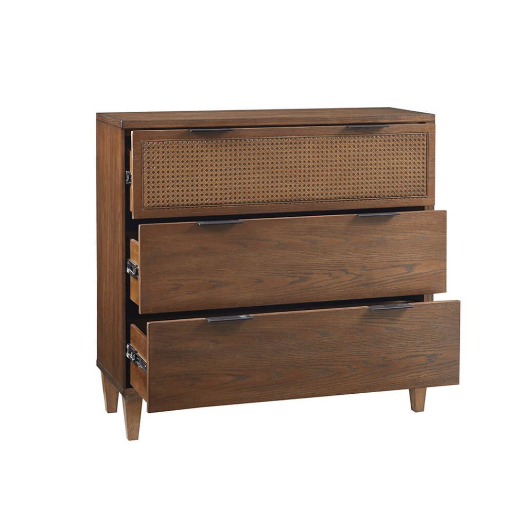 Close-up of the drawer handles on the stylish storage chest, emphasizing its contemporary look.