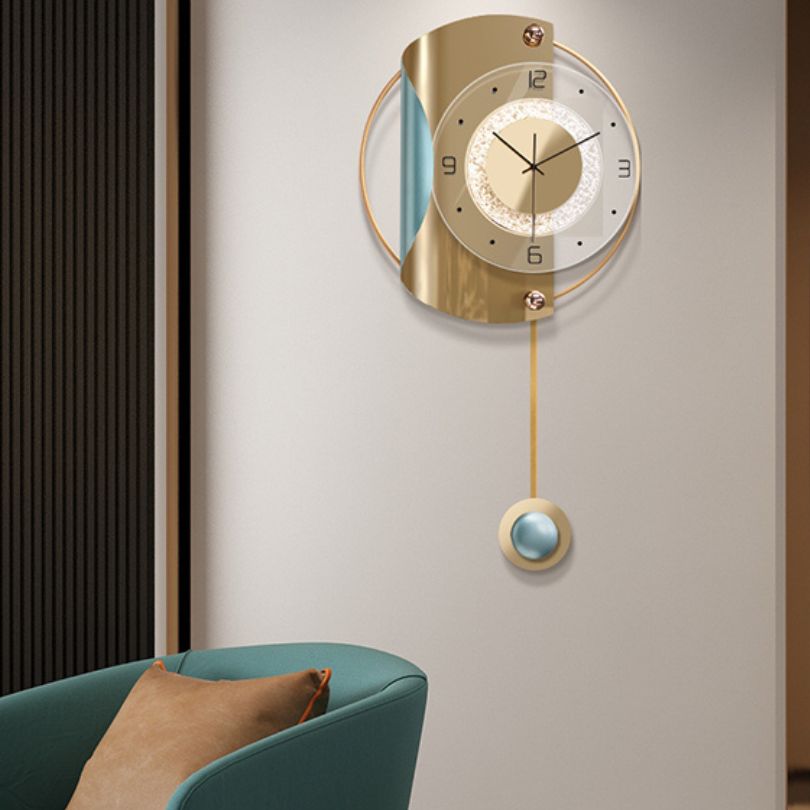 Elegant gold backlit wall clock mounted on a stylish wall, enhancing the modern decor.