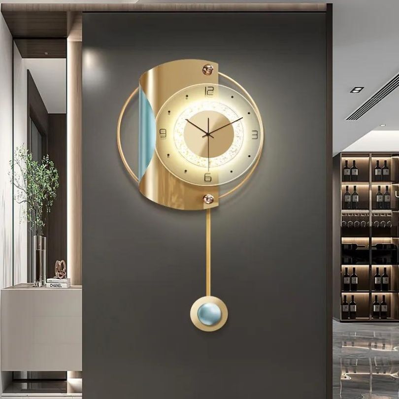 Elegant gold backlit wall clock mounted on a stylish wall, enhancing the modern decor.