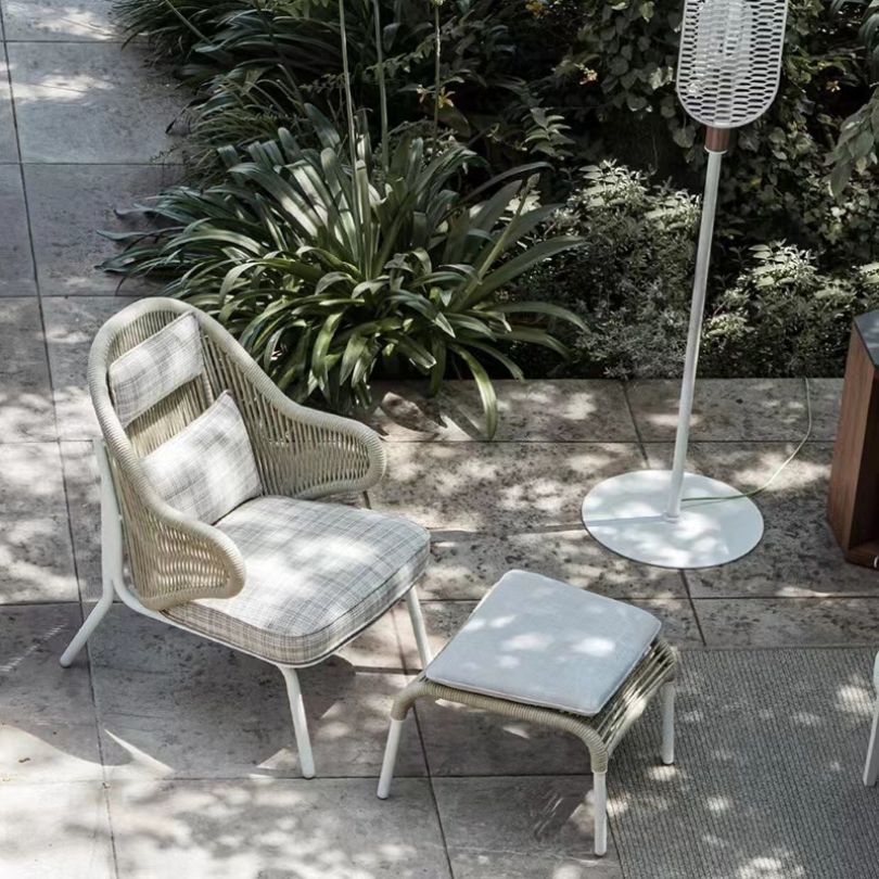 Comfortable leisure chair showcasing removable cushions and sleek design.