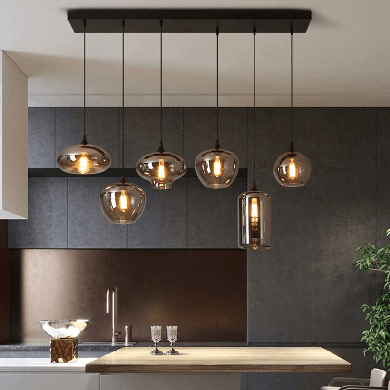 Chic glass bubble pendant lights over a modern office space.