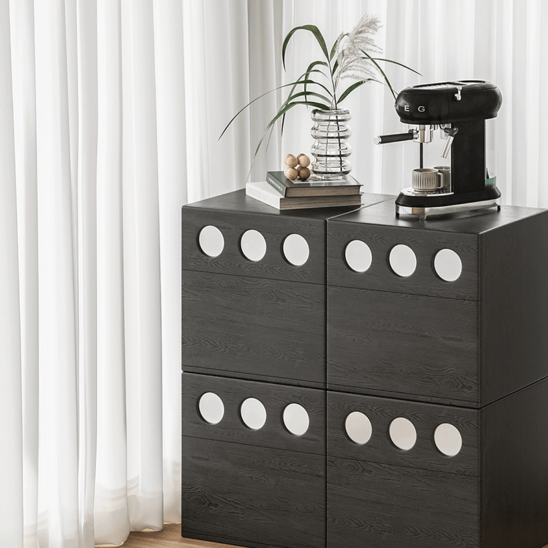 Open drawer of the contemporary wooden storage cabinet demonstrating storage capacity.