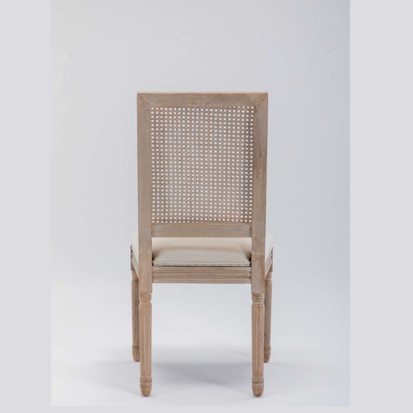 Side profile of dining chair highlighting high back and sturdy wooden legs