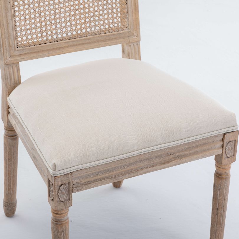 Close-up of rattan chair backrest with piped fabric and foam padding