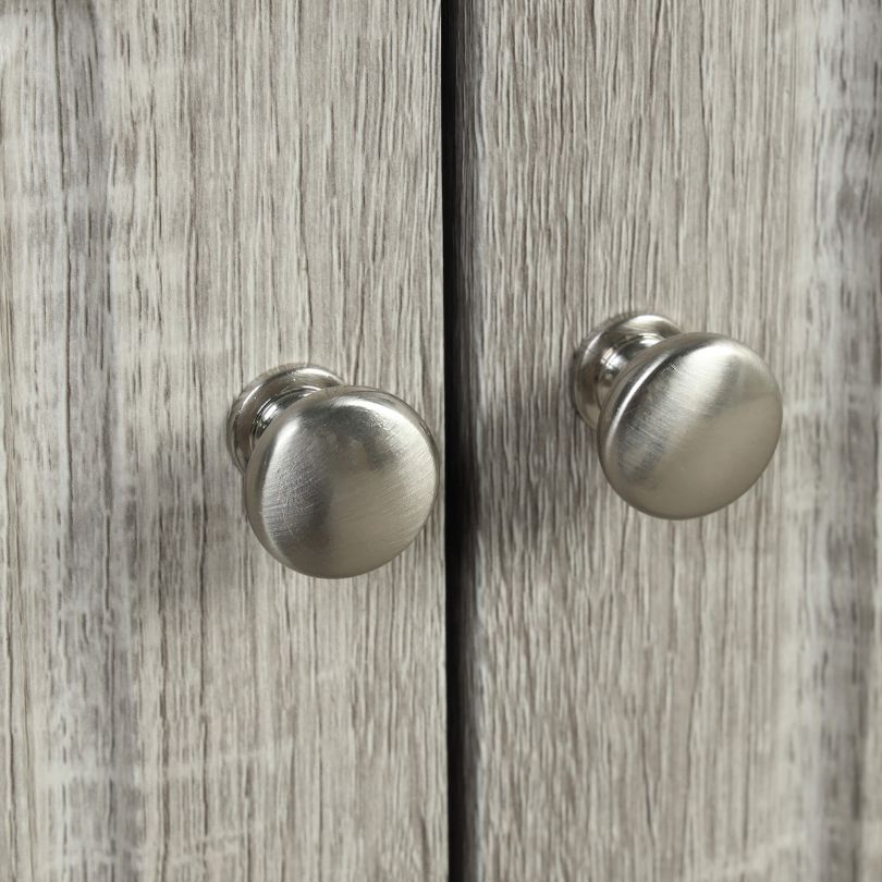 Side view of the corner oak cabinet, illustrating its compact design and modern aesthetic.