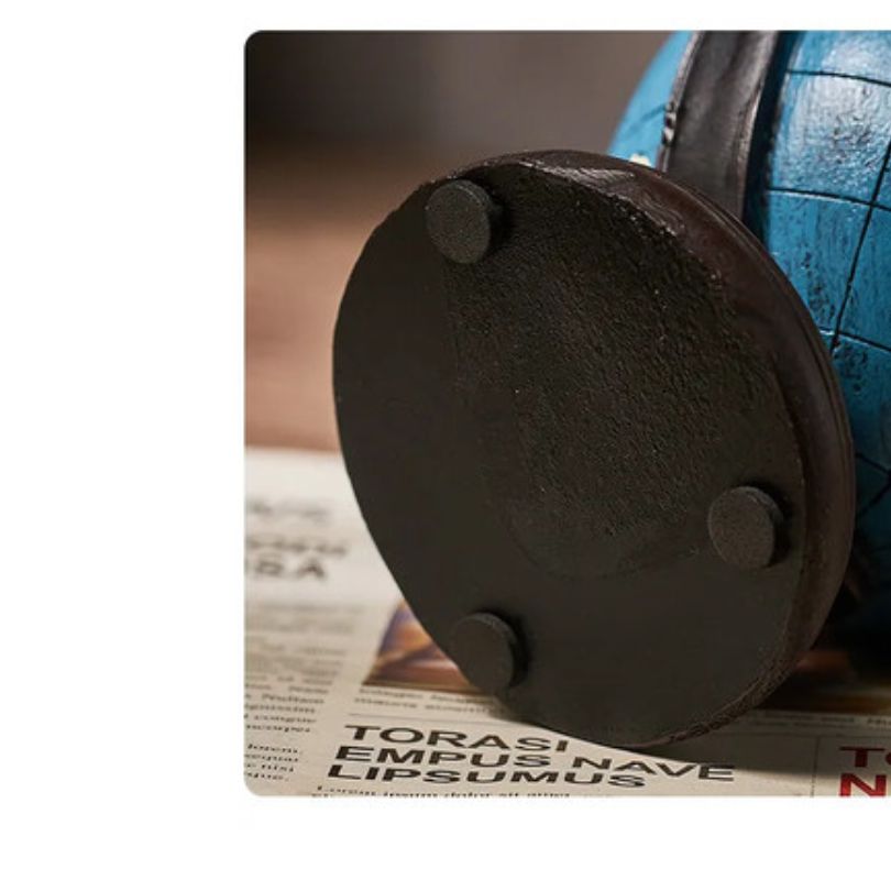 Stylish modern office decor featuring the globe-shaped pen holder