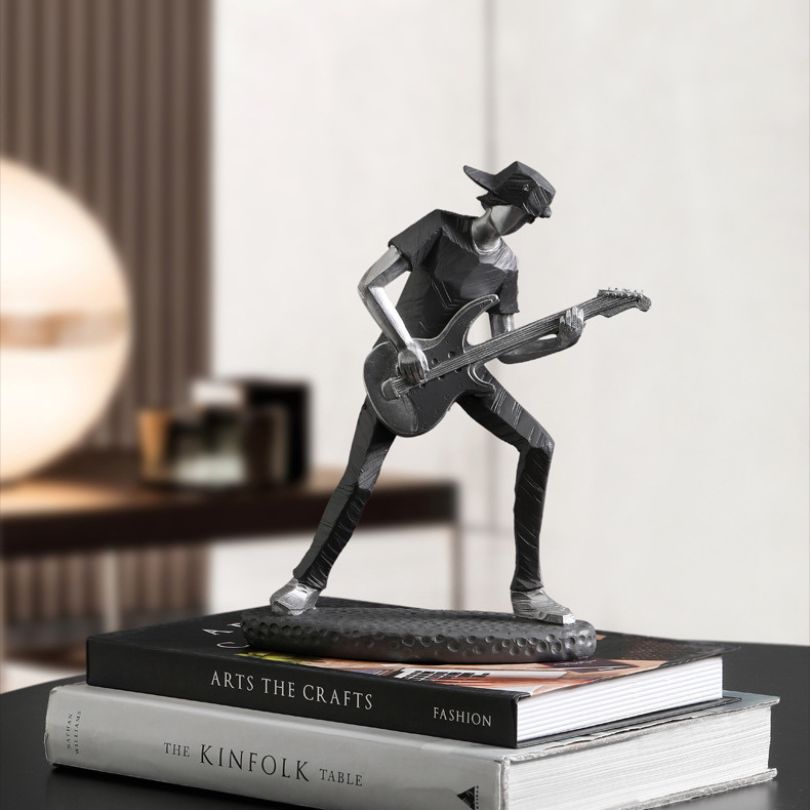 Close-up of the resin musician statue highlighting intricate details.