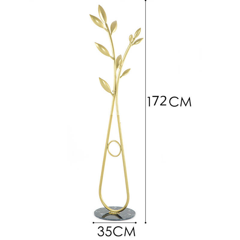 Gold coat rack positioned near the entrance, demonstrating its modern aesthetic and functional design.