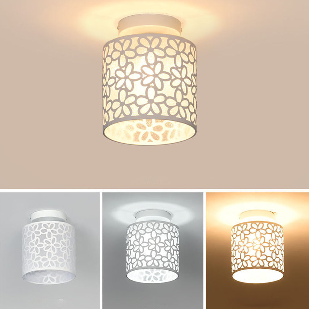 The chic floral print ceiling light installed in a stylish living room setting, providing ambient lighting.