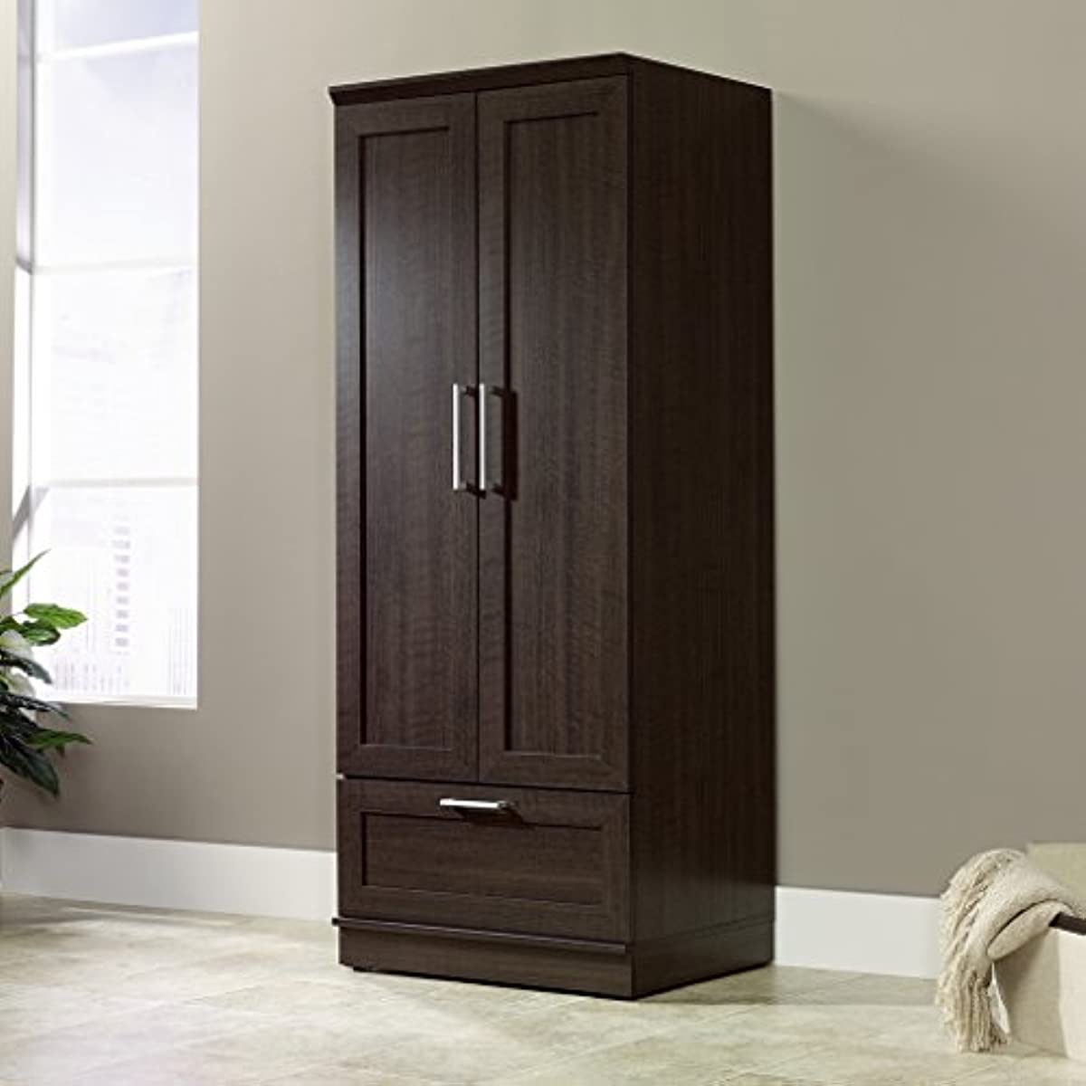 Dakota Oak wardrobe cabinet showing interior storage features and garment rod.