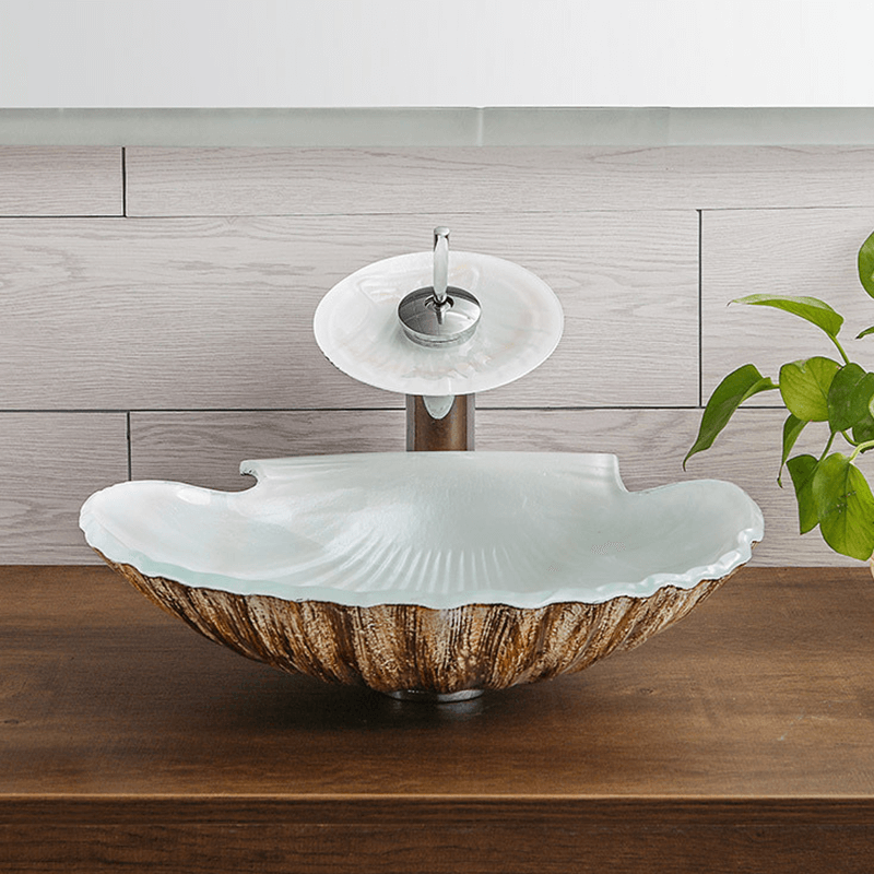 Elegant scallop-shaped sink in a modern bathroom setting, showcasing its unique design.