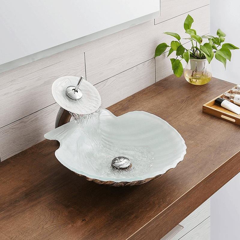 Elegant scallop-shaped sink in a modern bathroom setting, showcasing its unique design.