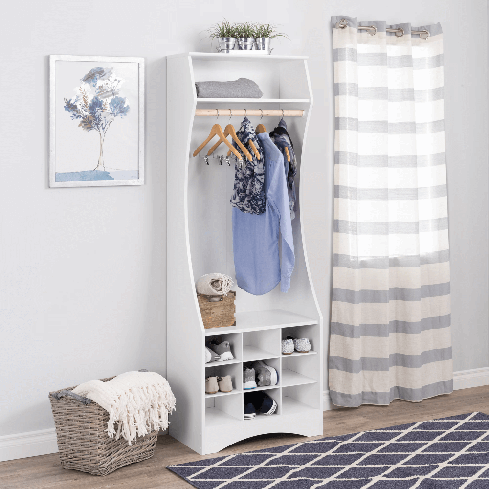 Sleek white compact wardrobe showcasing shoe storage cubbies