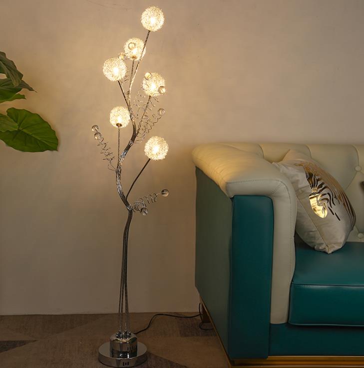 Aluminum wire flower branch LED lamp with remote, showcasing its elegant design and warm glow.