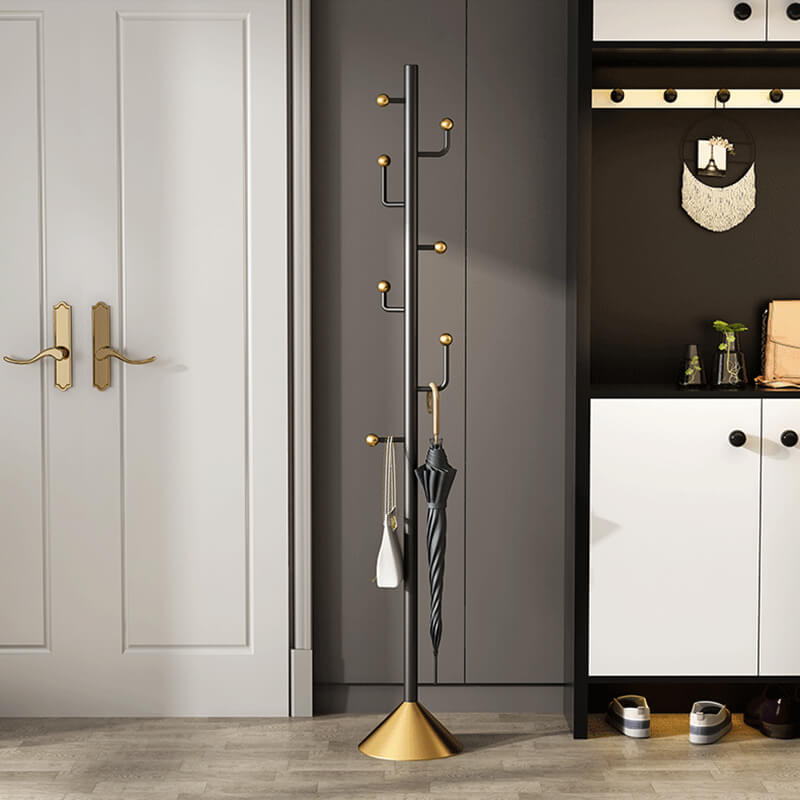 Side view of the coat rack in a cozy entryway, demonstrating its functionality.