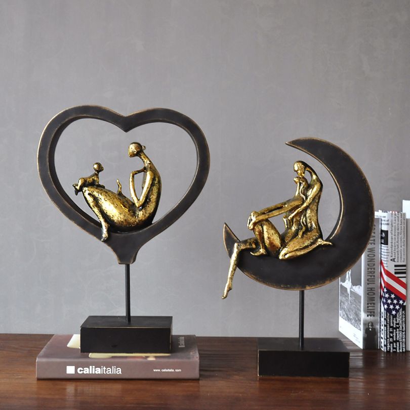Bronze sculpture displayed in a cozy living room setting, highlighting its elegance.