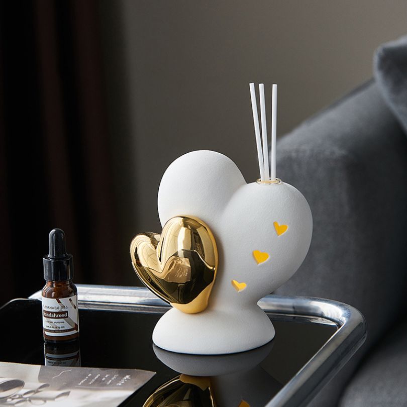 Elegant European ceramic love shape ornament showcasing intricate details from the front.