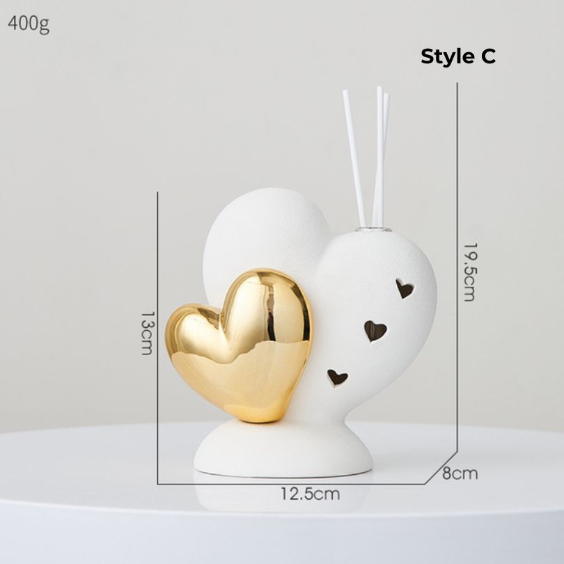 Side view of the ceramic love ornament highlighting its unique design and craftsmanship.