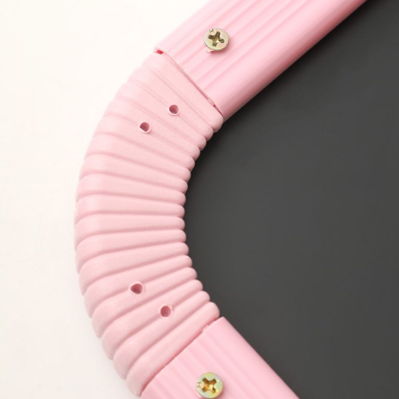Wall-mounted aesthetic mirror in a girls bedroom, highlighting its contemporary style and color options.