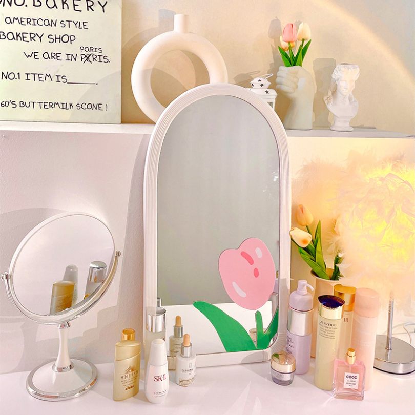 Stylish modern mirror for girls bedrooms, showcasing its sleek design and adjustable angle.