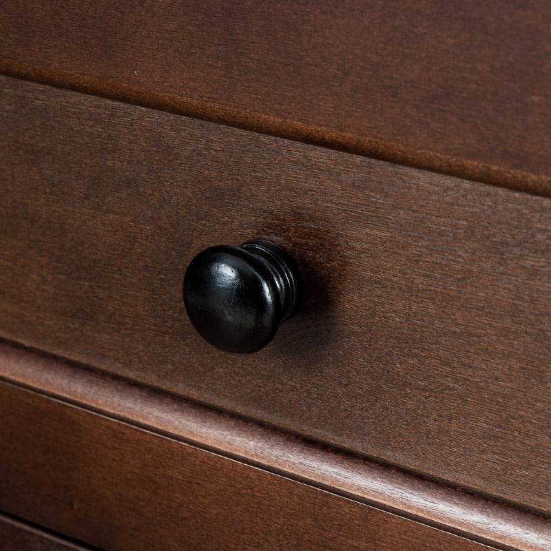 Front view of the rustic farmhouse dresser showcasing four drawers and round handles.