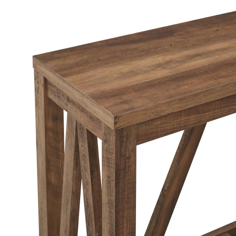 Rustic reclaimed wood console table showcasing open shelf and decorative items.