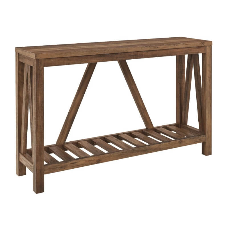 Rustic reclaimed wood console table showcasing open shelf and decorative items.