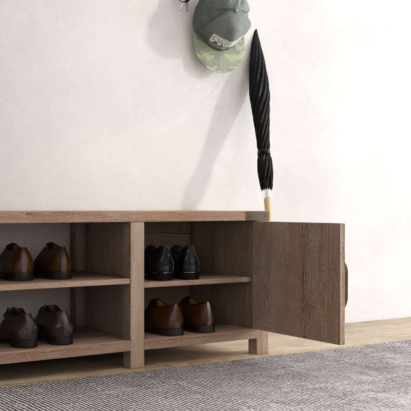 Side view of the entryway bench demonstrating its compact size and four shelves for shoe storage.