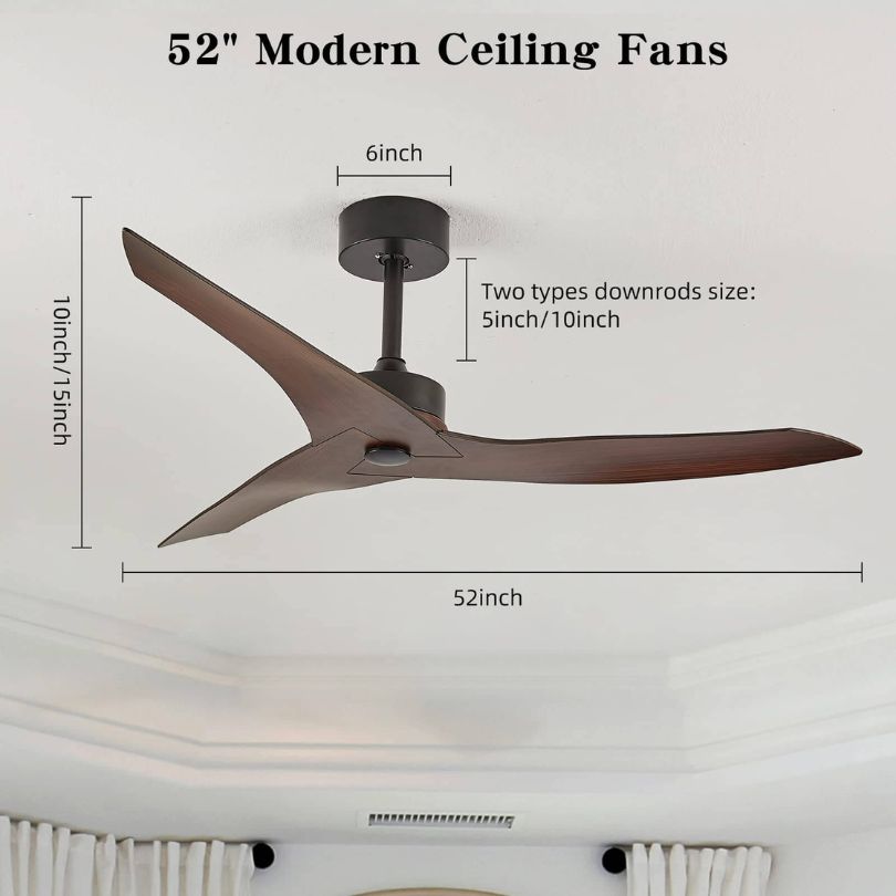 Close-up of walnut blades and motor casing in rustic ceiling fan