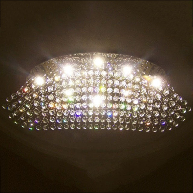 Stylish teardrop crystal flush mount light enhancing a modern kitchen island