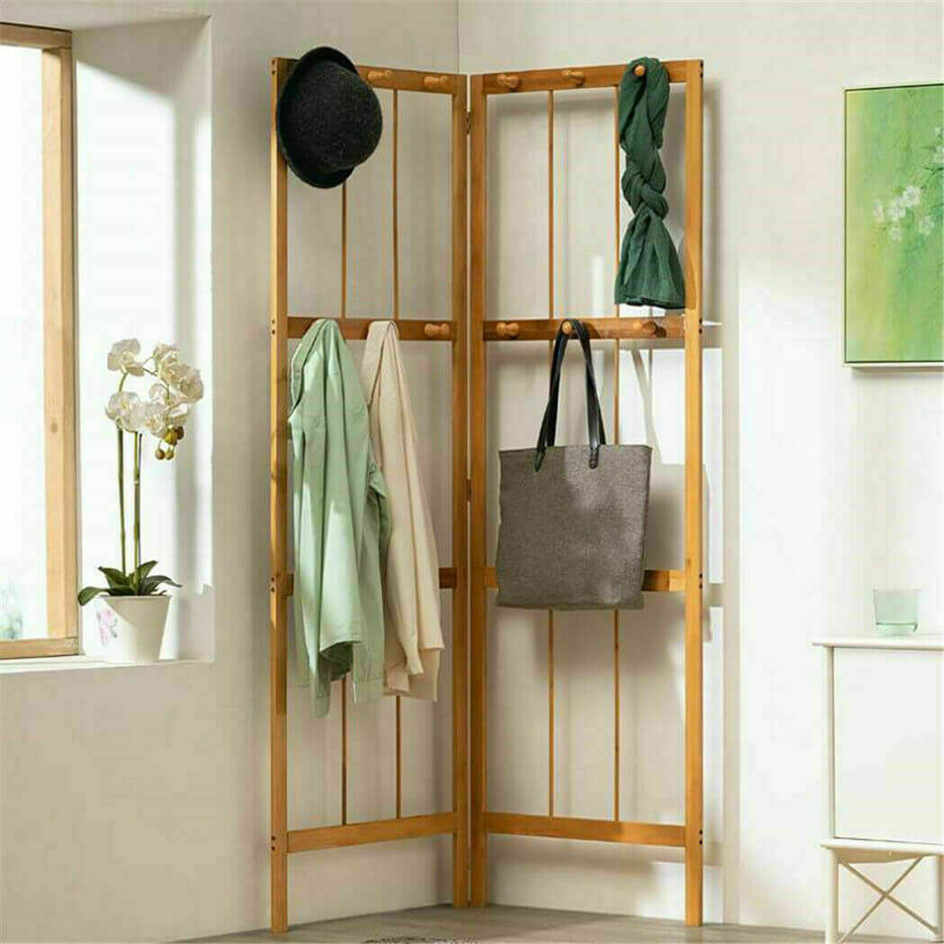 Bamboo coat rack in a stylish hallway, showcasing its hooks and modern design.
