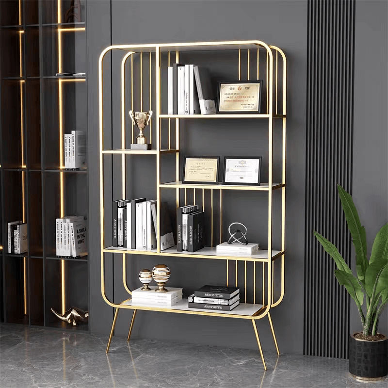 Elegant gold multi-layer bookshelf showcasing books and decor in a modern living room.
