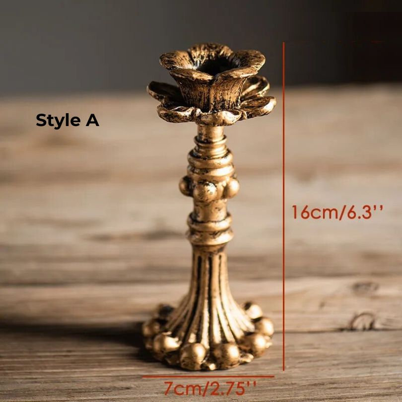 Elegant rustic gold candle holder styled with a scented candle.