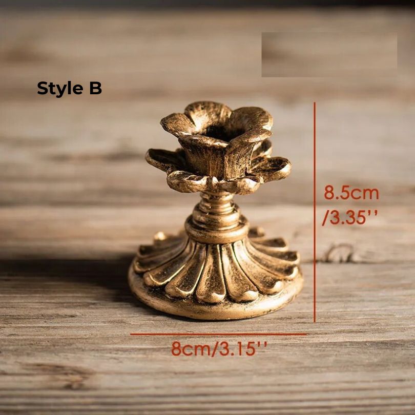 Close-up view of the vintage candle holder showcasing its antique resin finish.